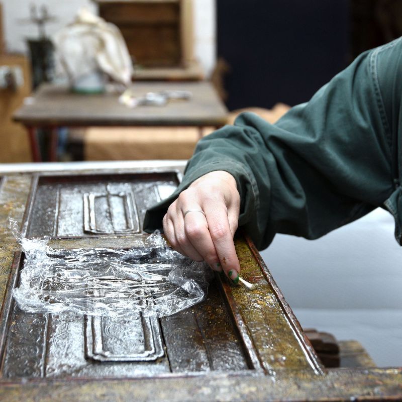 Oriental antique furniture restoration of a Tibetan cabinet in our Wiltshire restoration workshops