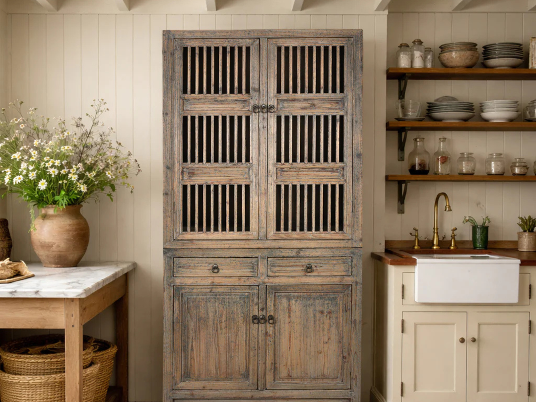 Rustic antique cabinet in a traditional countryside style farmhouse