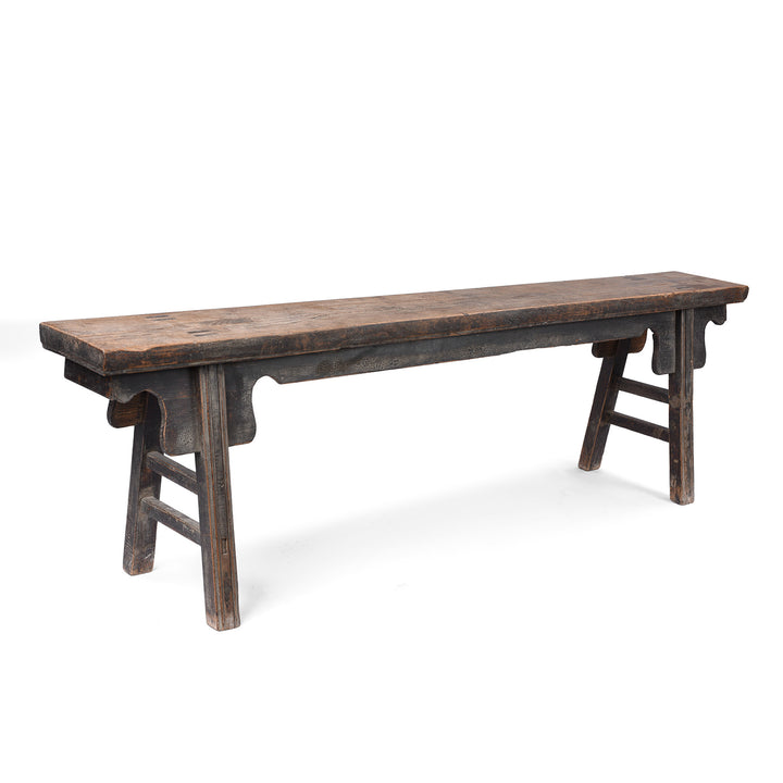 19th century Chinese rustic solid walnut farm bench with thick plank top, trestle legs, original patina and traces of historic dark lacquer | Indigo Antiques