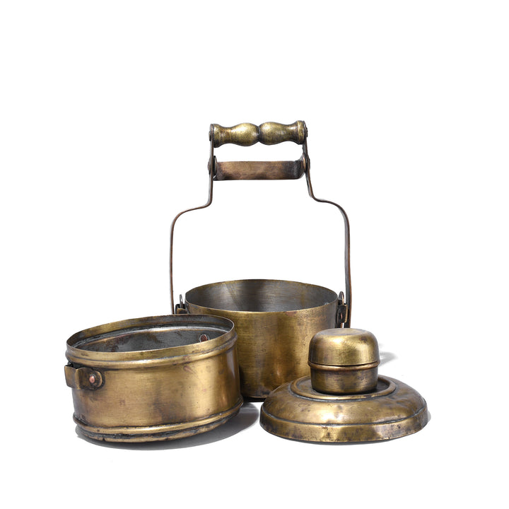 Deconstructed View Of Antique Brass Two Tier Indian Tiffin With Domed Lid And Handle