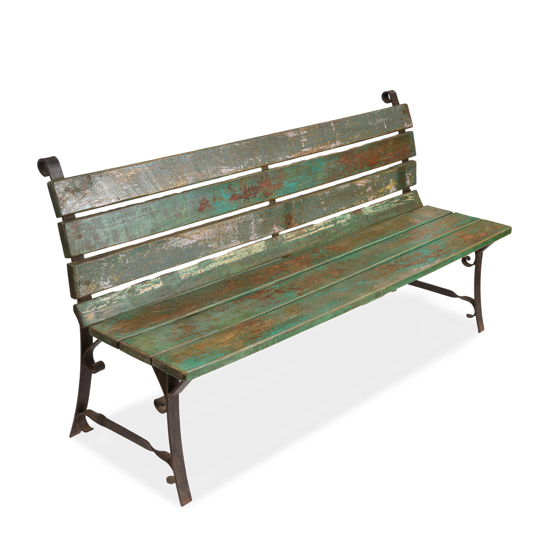 Angled VIew Of Vintage Green Painted Slatted Teak Bench | Indigo Antiques