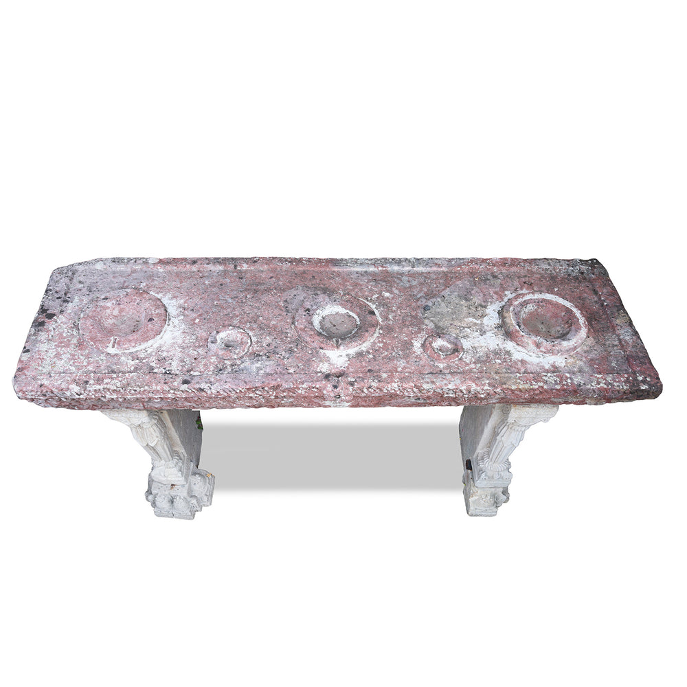Top Down View Of Antique Indian Parinda Water Pot Stand With Carved Red Sandstone Top And Ornate White Stone Legs