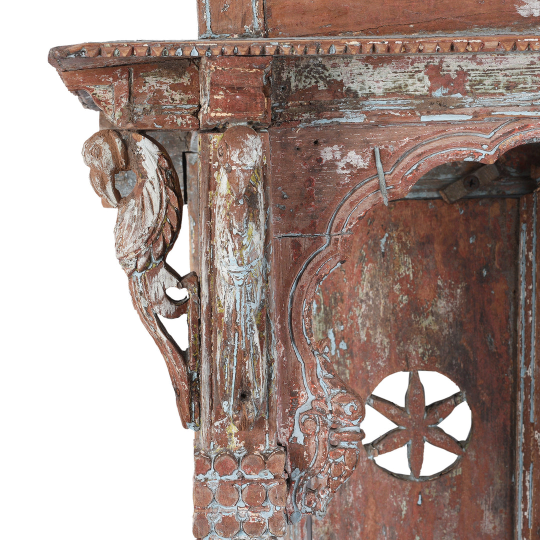 Corner Detail Showing Carved Parrot On Antique Painted Teak House Shrine From Gujarat | indigo Antiques