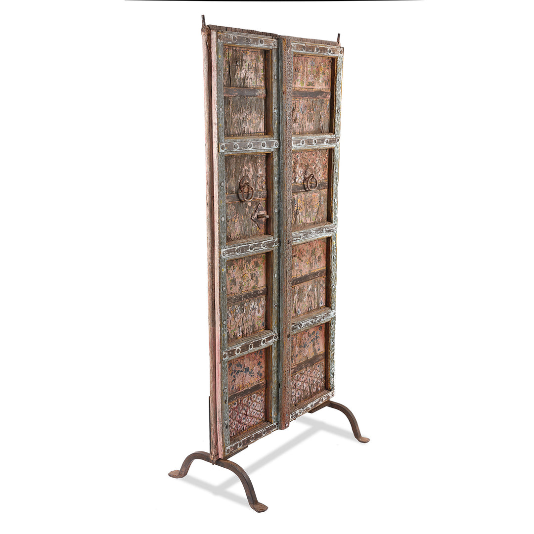 Angled View Of Antique Painted Doors From Rajasthan With Later Paint - 19th Century | Indigo Antiques