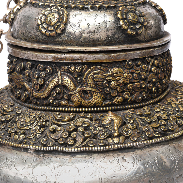 Dragin & Tibetan symbol detail on a Vintage Silver Plated Tibetan Teapot deorated with dragons & makara | Indigo Antiques