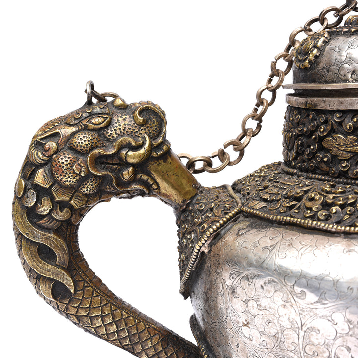 Lion handle detail on a Vintage Silver Plated Tibetan Teapot deorated with dragons & makara | Indigo Antiques