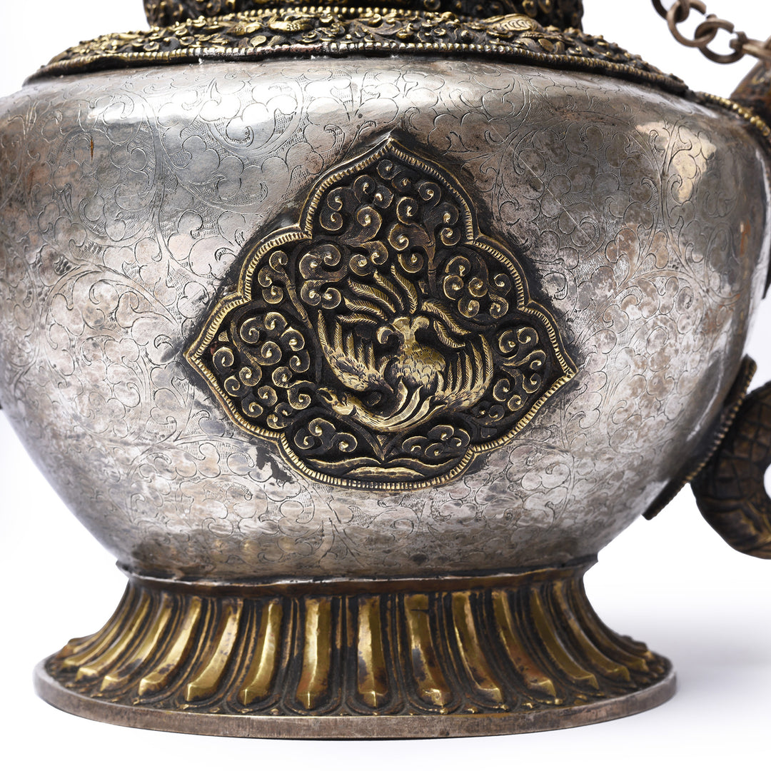 Crane detail on a Vintage Silver Plated Tibetan Teapot deorated with dragons & makara | Indigo Antiques