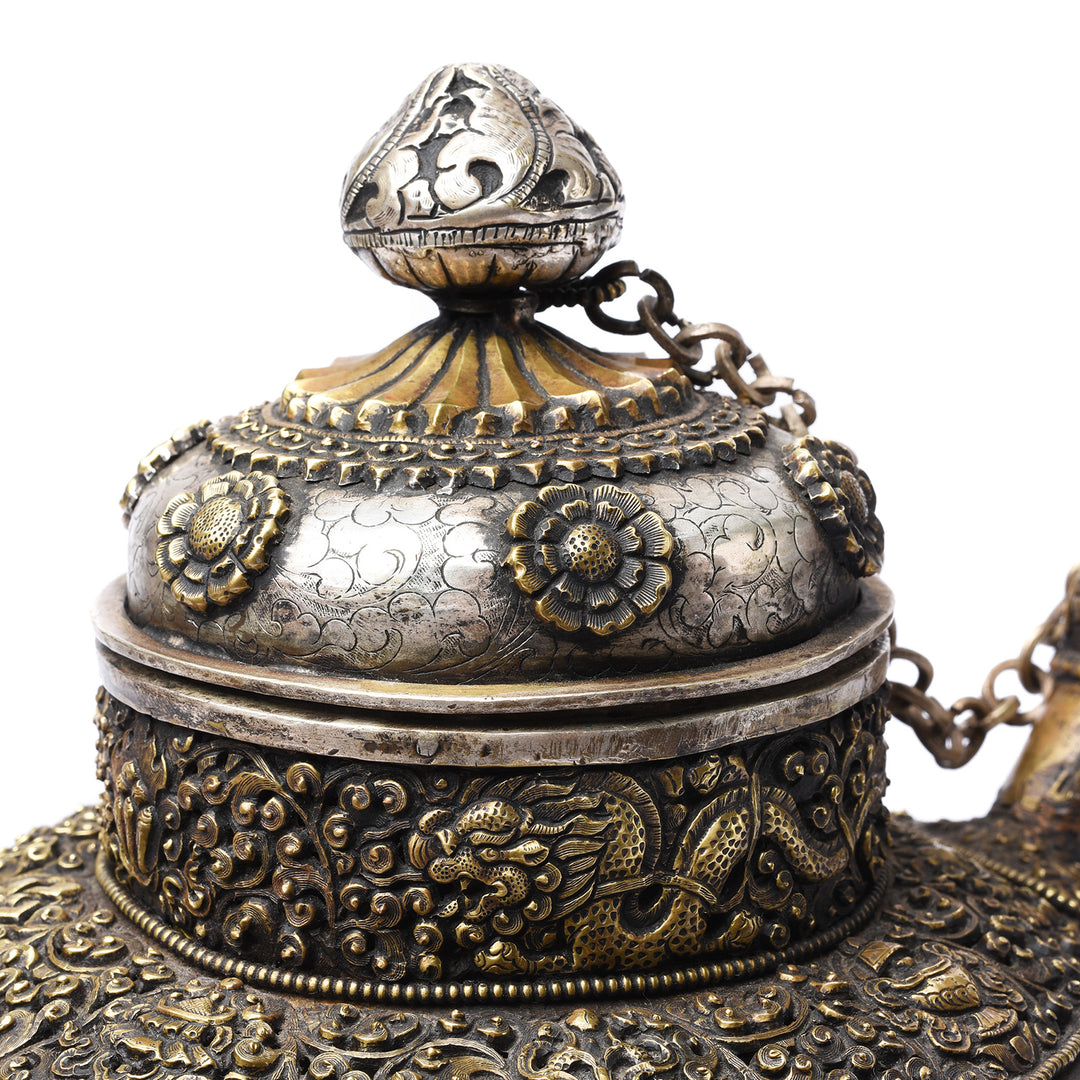 Lid detail on a Vintage Silver Plated Tibetan Teapot deorated with dragons & makara | Indigo Antiques
