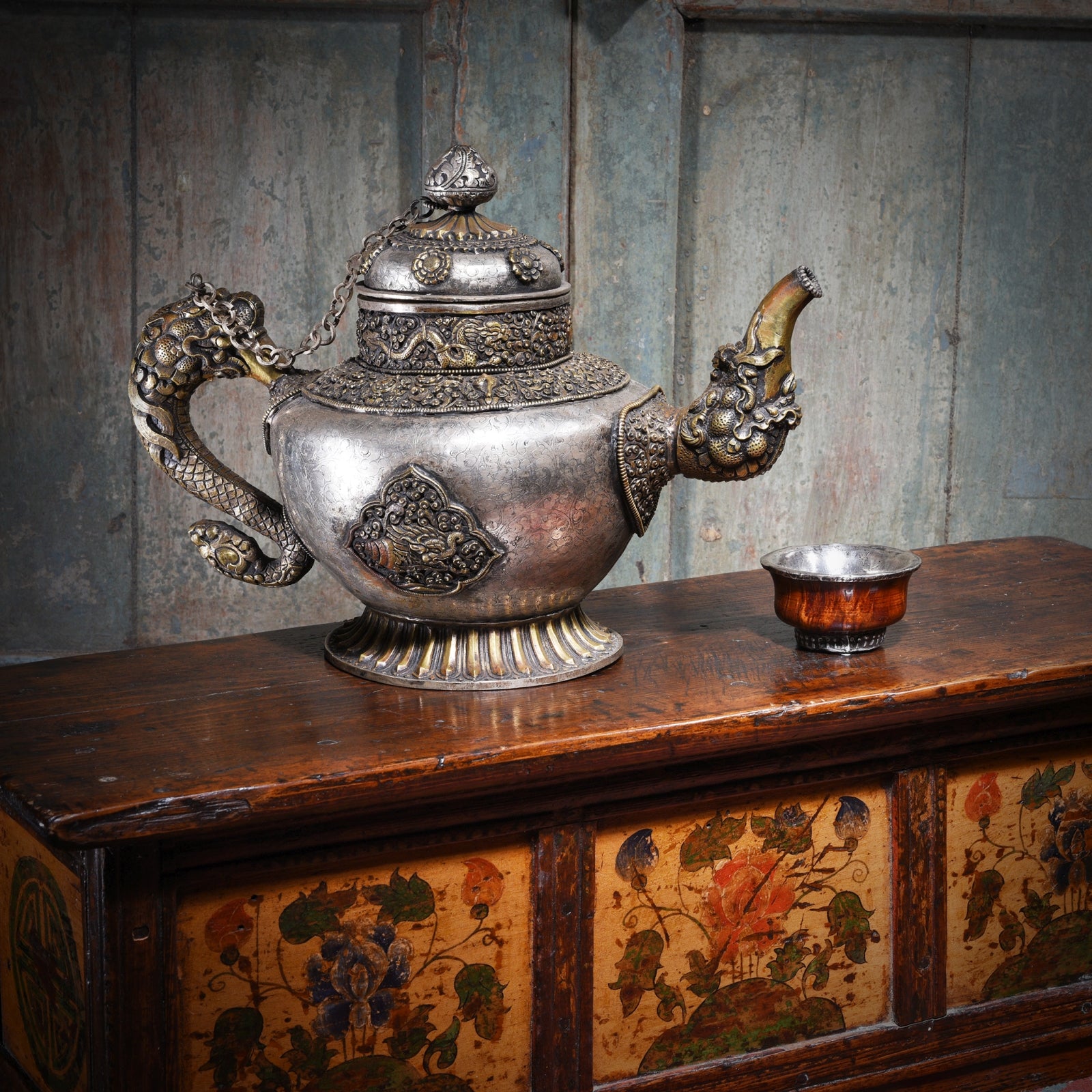Vintage Silver Plated Tibetan butter Teapot on an antique painted choksar prayer table | Indigo Antiques