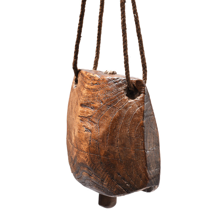 Angled View Of Antique Carved Teak Cow Bell From Rajasthan - Early 20th Century | Indigo Antiques