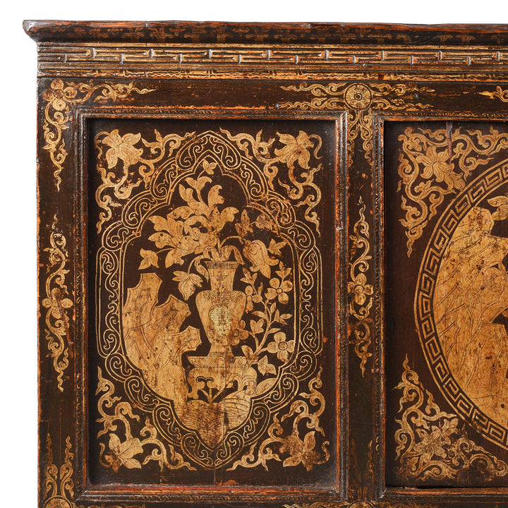 Corner Detail Displaying Floral Paintowrk From Gilt & Black Painted Tibetan Altar Cabinet | Indigo Antiques