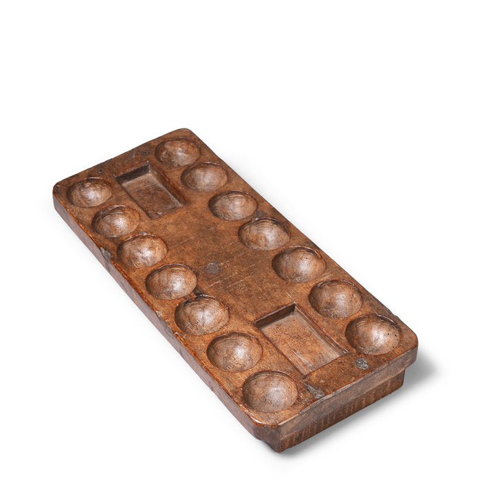 Angled View Of Antique Mancala Game Board From Kerala | Indigo Antiques