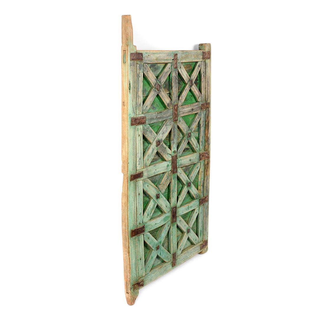 Side detail of an Antique Green Painted Indian Wooden Stick Door From Jaisalmer - 19thC | Indigo Antiques