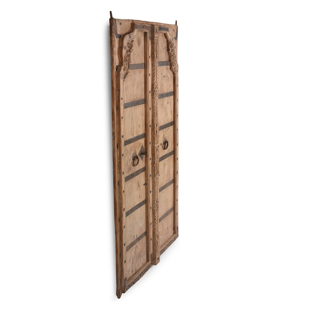 Angled View Of Antique Carved Bleached Doors From Bikaner -  | INDIGO ANTIQUES