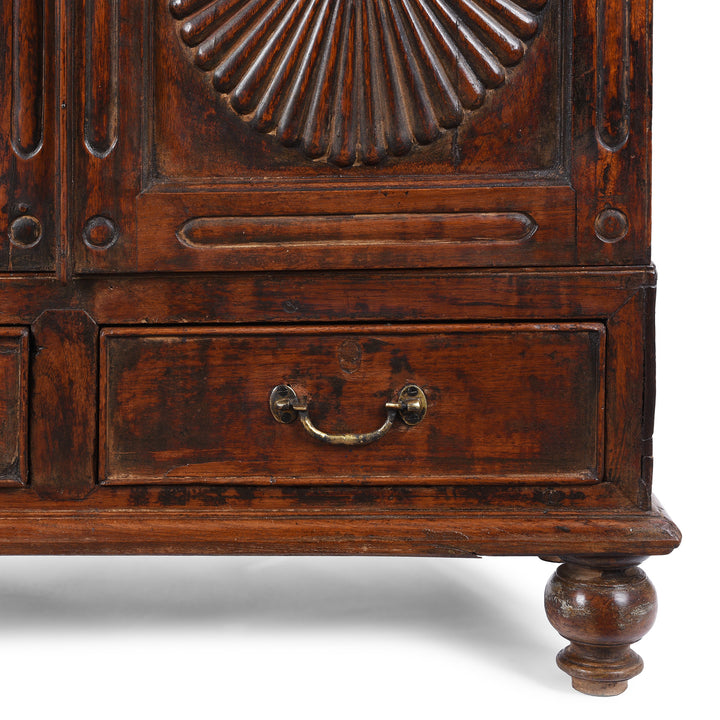 Foot Detail From Antique Teak Almirah Cabinet With Sunburst Panels | Indigo Antiques
