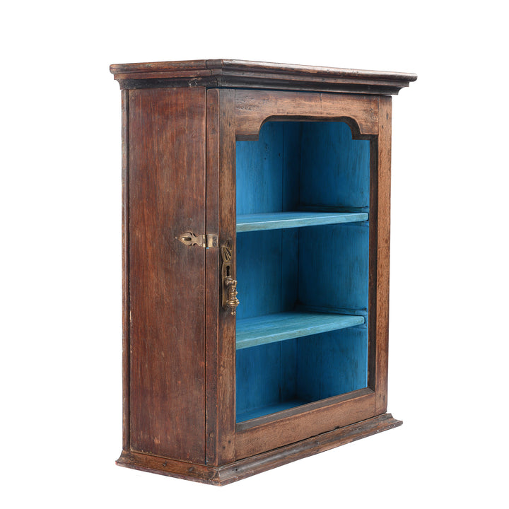 Angled View Of Antique Glazed Teak Wall Cabinet With Blue Interior From Gujarat - Ca 1930 | Indigo Antiques