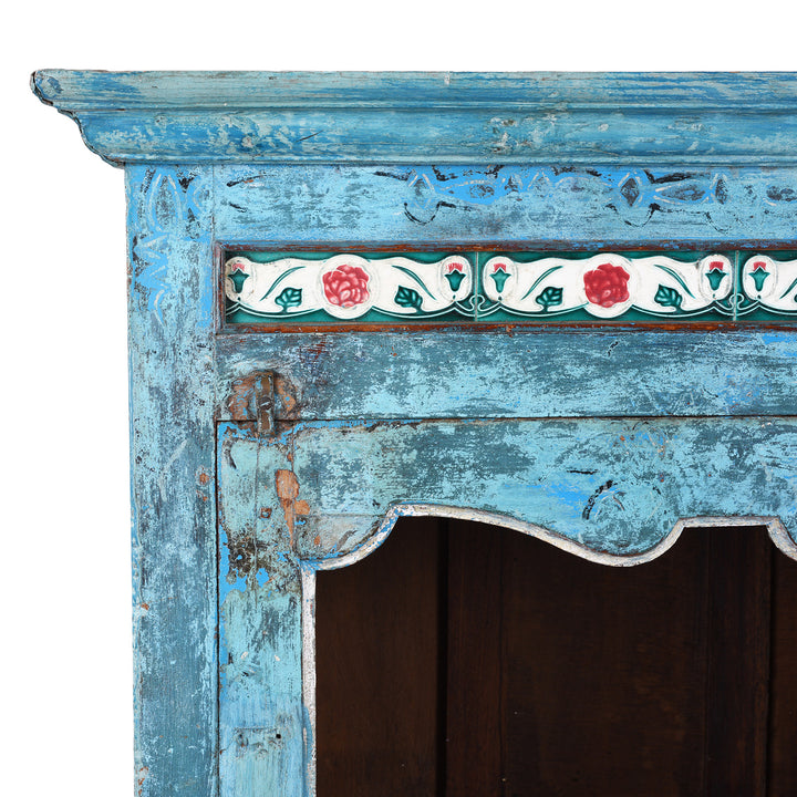 Corner Detail Showing Faded Paintwork And TIles From Antique Indian Painted Teak Glazed Cabinet | Indigo Antiques