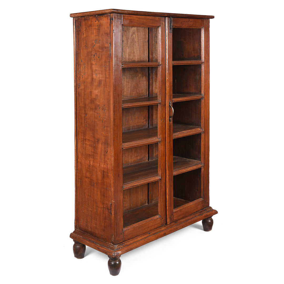 Angled View Of Antique Teak Anglo Indian Glazed Book Cabinet From Gujarat | Indigo Antiques