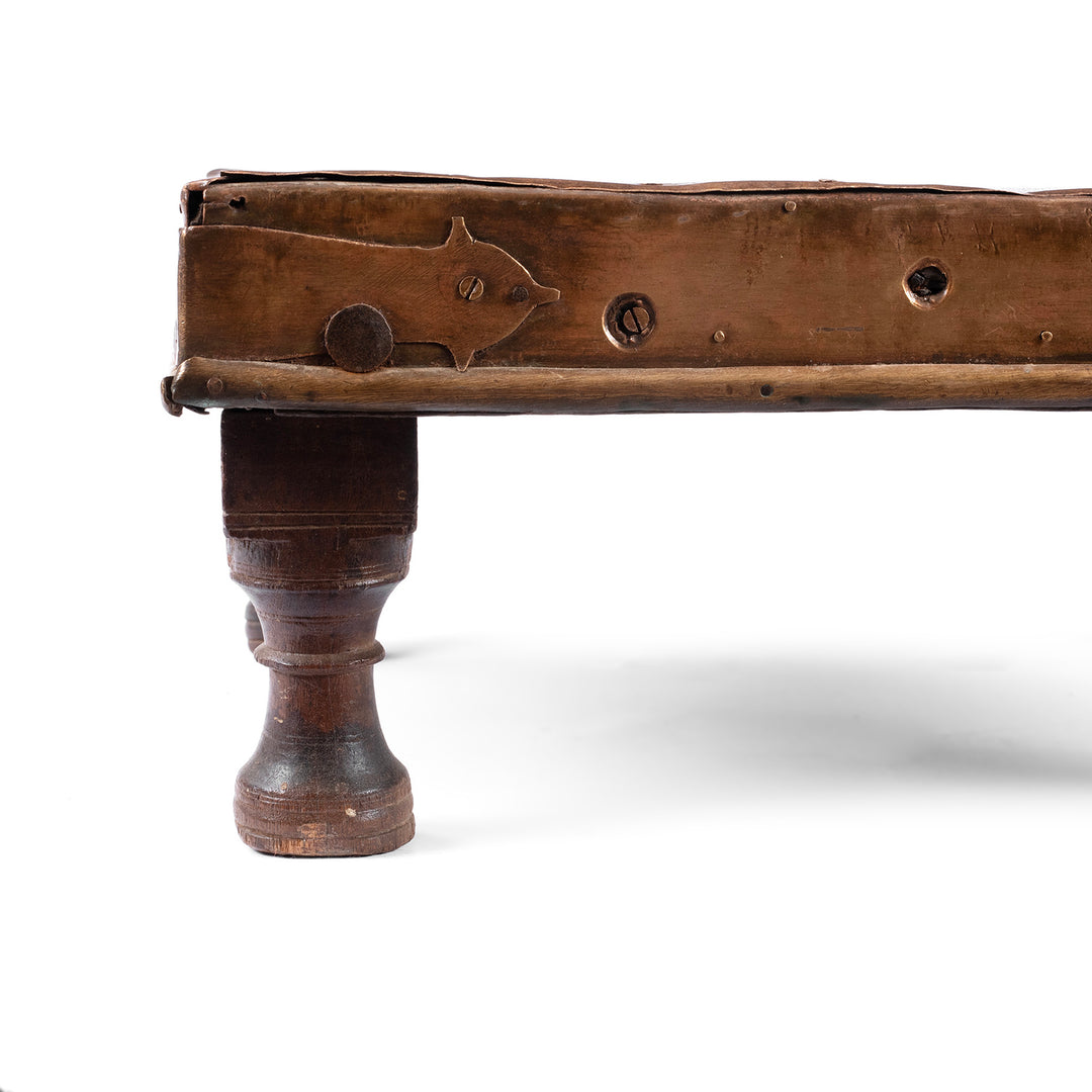 Corner Detail Showing Brass Binding And Turned Leg From Antique Indian Brass Bajot Low Table From Shekhawati | Indigo Antiques