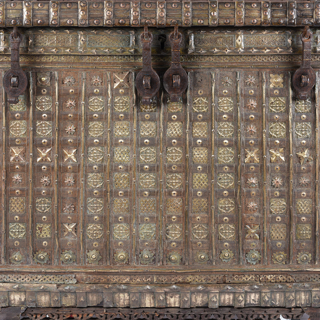 Central Detail Displaying Iron And Brass Decorations On Antique Brass Bound Indian 'Pithara' Chest From Gujarat  | Indigo Antiques