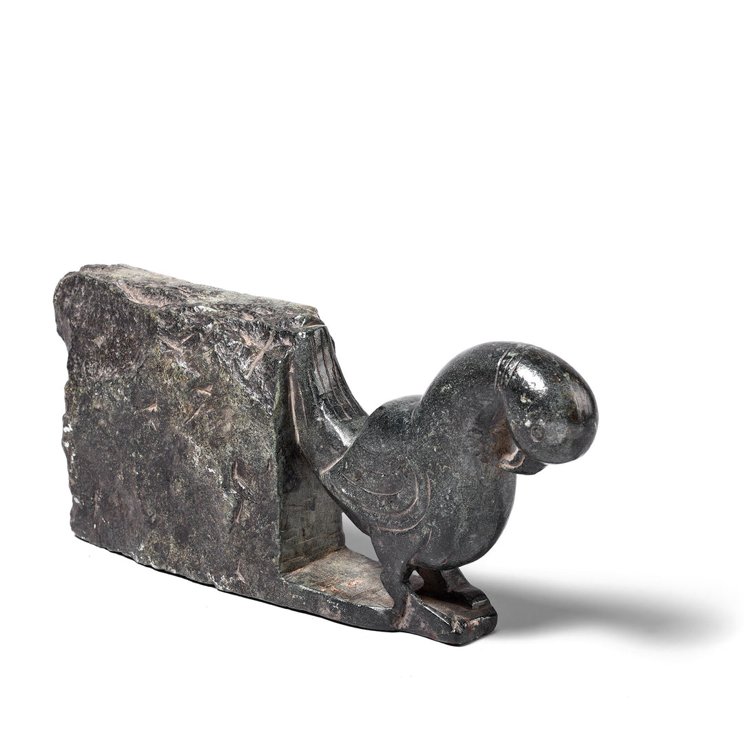 Angled View Of Antique Stone Khunti Parrot Turban Hanger | Indigo Antiques