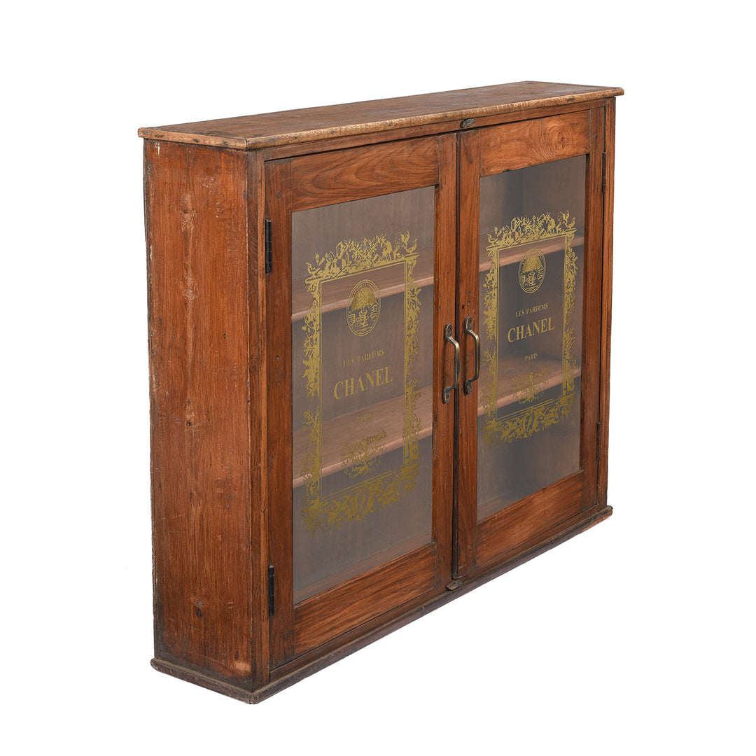 Angled VIew Of Glazed Teak 'Chanel' Wall Cabinet  | Indigo Antiques