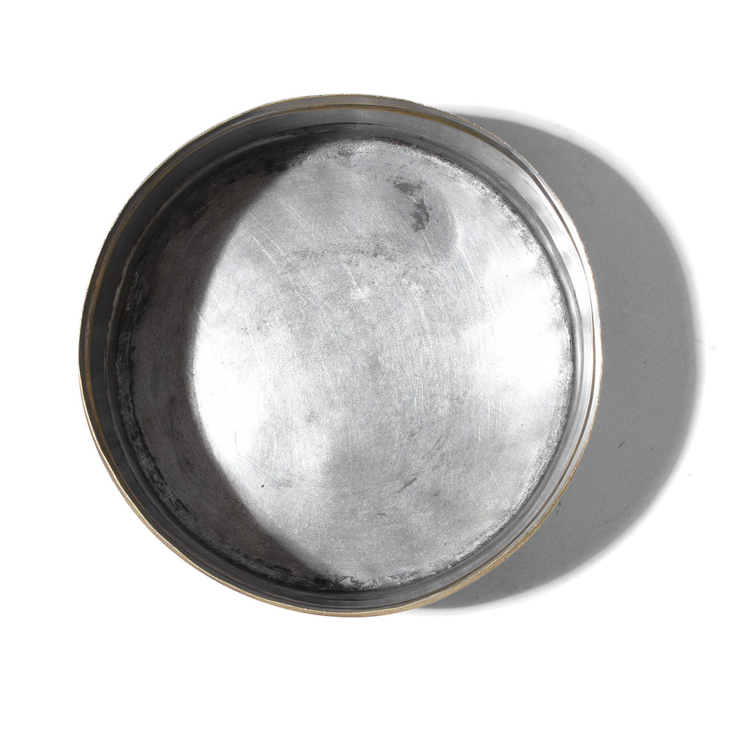 Interior Of Antique Brass Indian Two Tier Tiffin With Folding Wire Handle