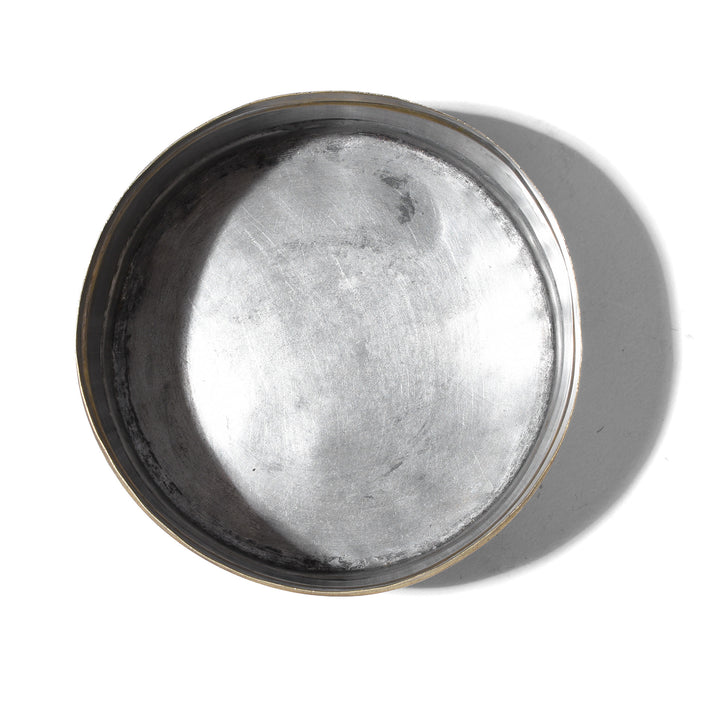 Interior Of Antique Brass Indian Two Tier Tiffin With Folding Wire Handle