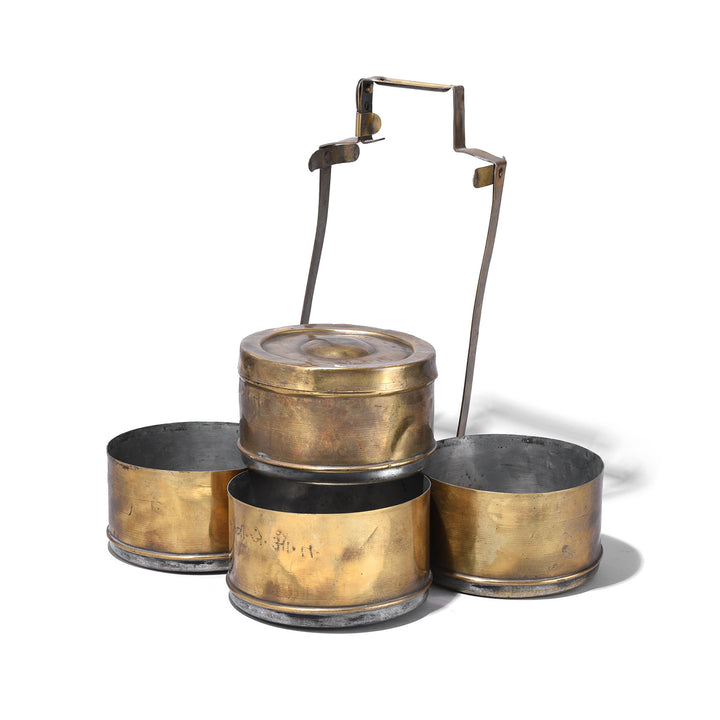 Deconstructed View Of Antique Brass Indian Multi Tiered Tiffin With Carry Handle