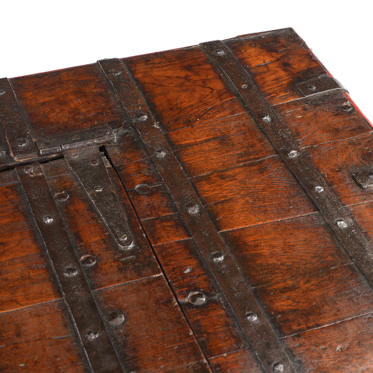 Top Corner Detail From Antique Indian Brass Bound Teak Chest On Wheels | Indigo Antiques