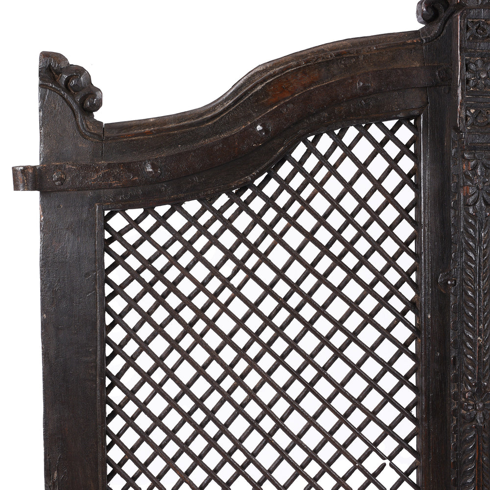 Corner Detail Displaying Carved edges On Antique Teak & Iron Jali Dog Gate From Gujarat | INDIGO ANTIQUES