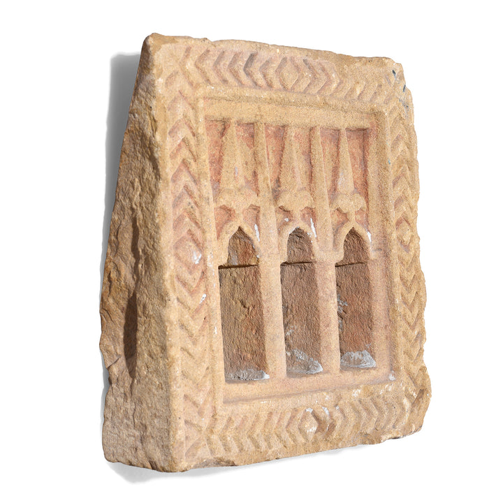 Angled View Of 19th Century Hand Carved Jaisalmer Sandstone Three Way Lamp Niche With Arched Openings From Rajasthan