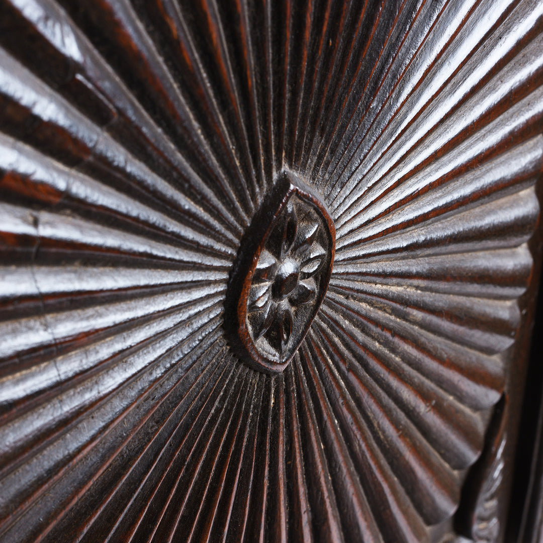 Sunburst Detail From Antique Indian Teak Almirah Cabinet With Hand Carved Sunburst Panels And Rich Aged Patina