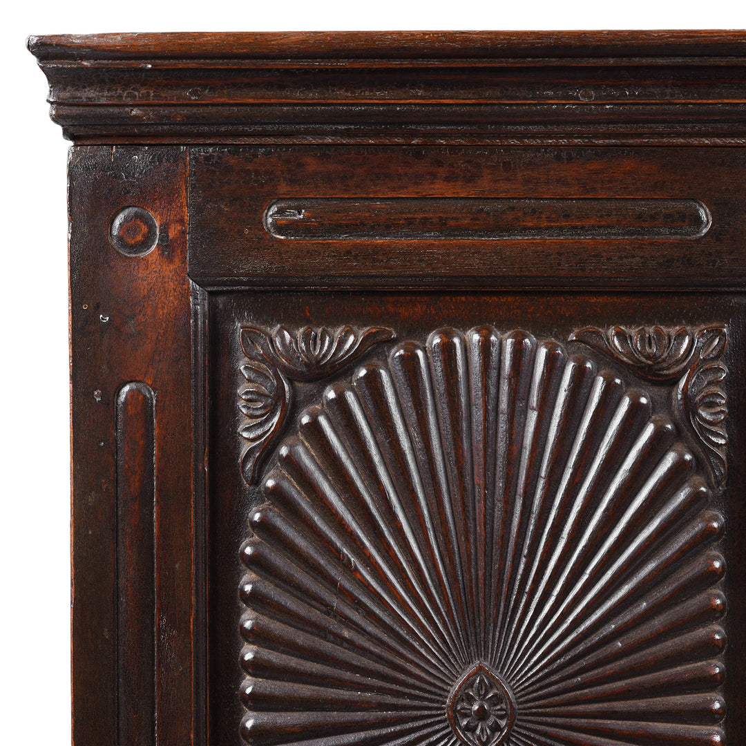 Corner Detail From Antique Indian Teak Almirah Cabinet With Hand Carved Sunburst Panels And Rich Aged Patina