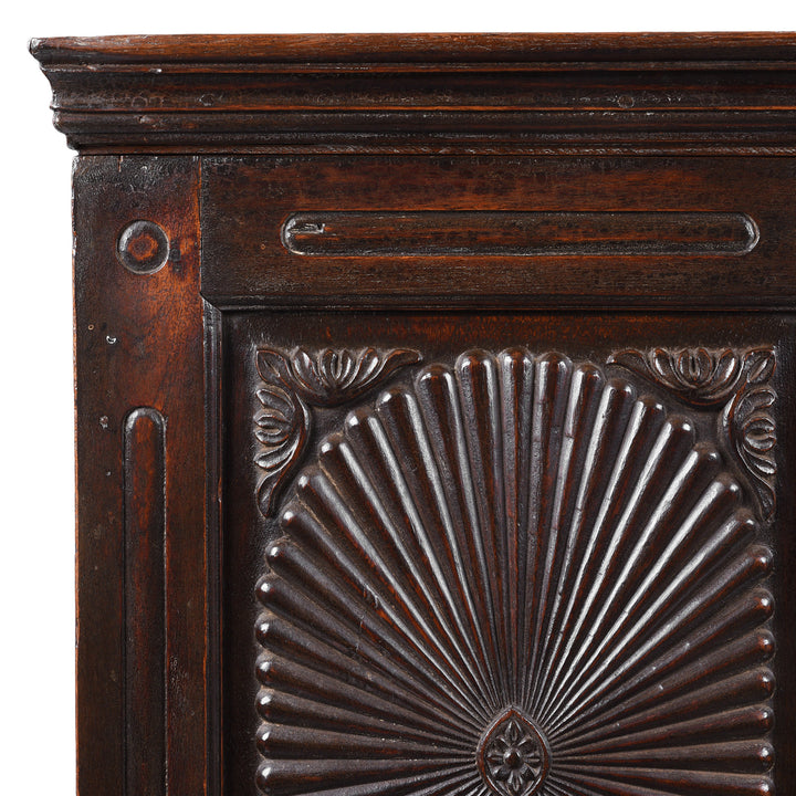 Corner Detail From Antique Indian Teak Almirah Cabinet With Hand Carved Sunburst Panels And Rich Aged Patina