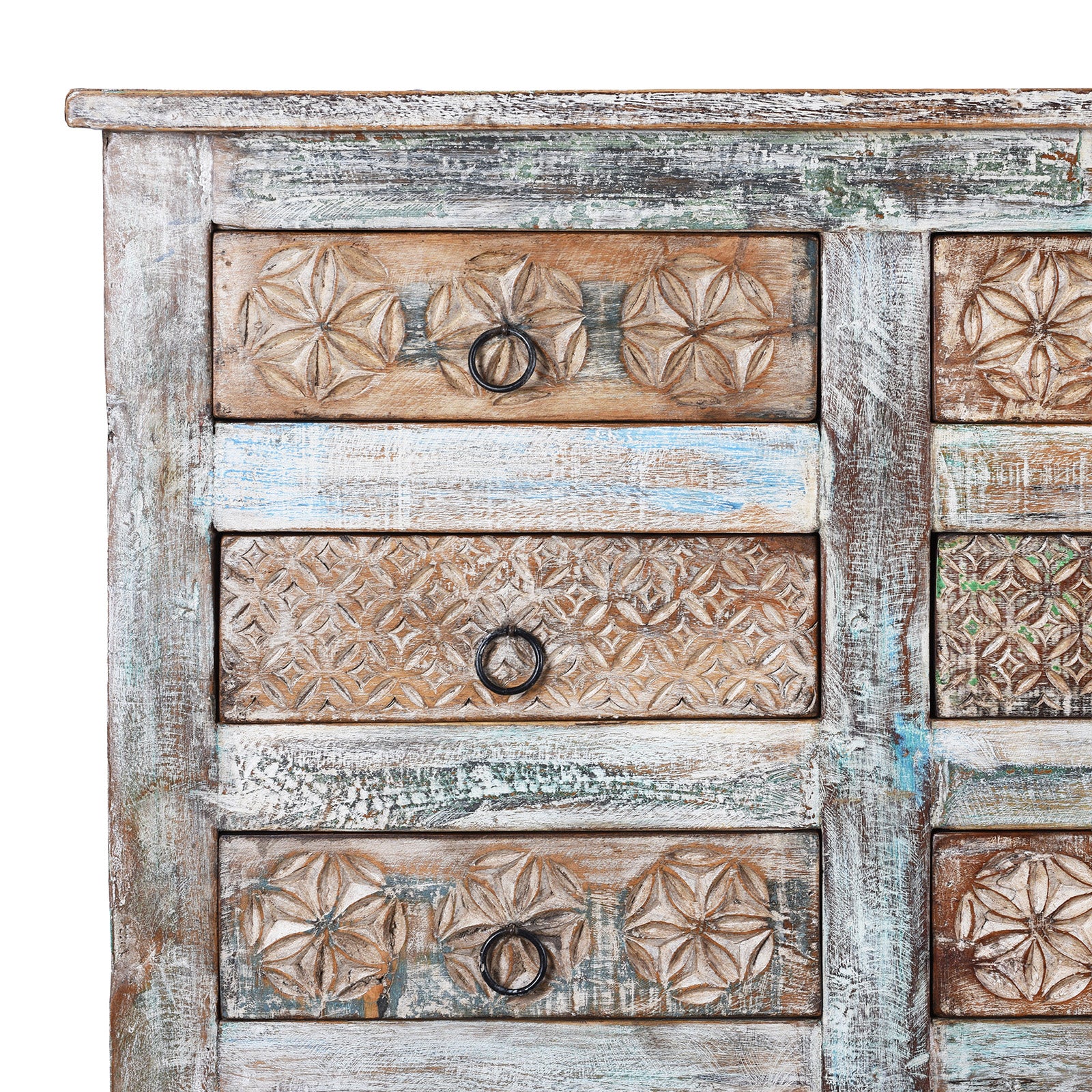 Conrer Detail From Reclaimed Teak Chest Of Drawers With Distressed Paint And Twenty Hand Carved Drawer Fronts | Indigo Antiques