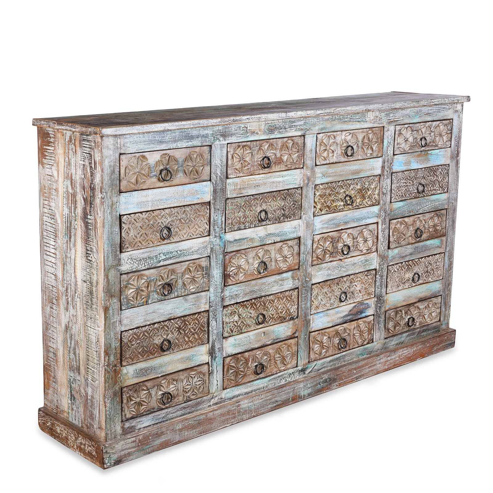 Angled View Of Reclaimed Teak Chest Of Drawers With Distressed Paint And Twenty Hand Carved Drawer Fronts | Indigo Antiques
