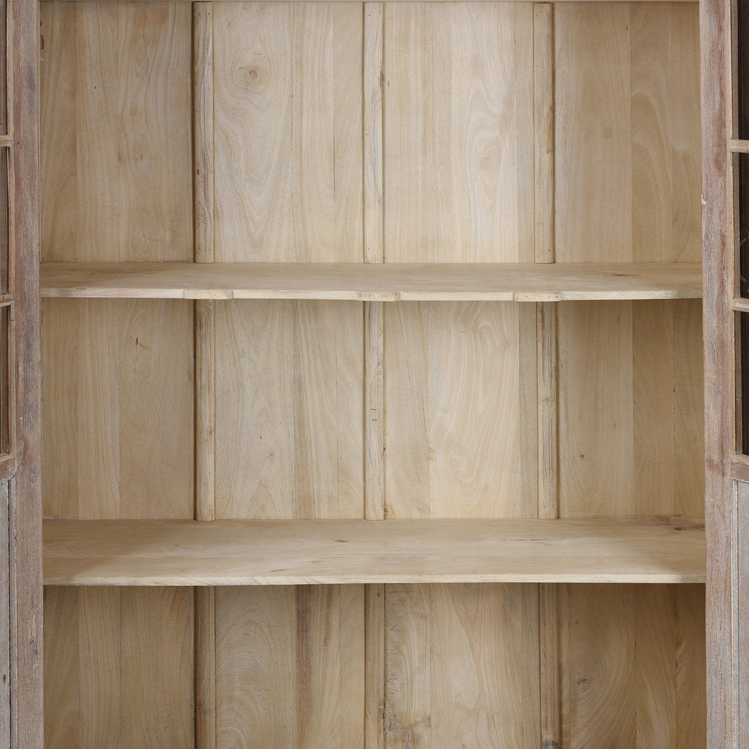 Interior Detail From Reclaimed Teak Glazed Cabinet With Four Glass Doors And Internal Shelving