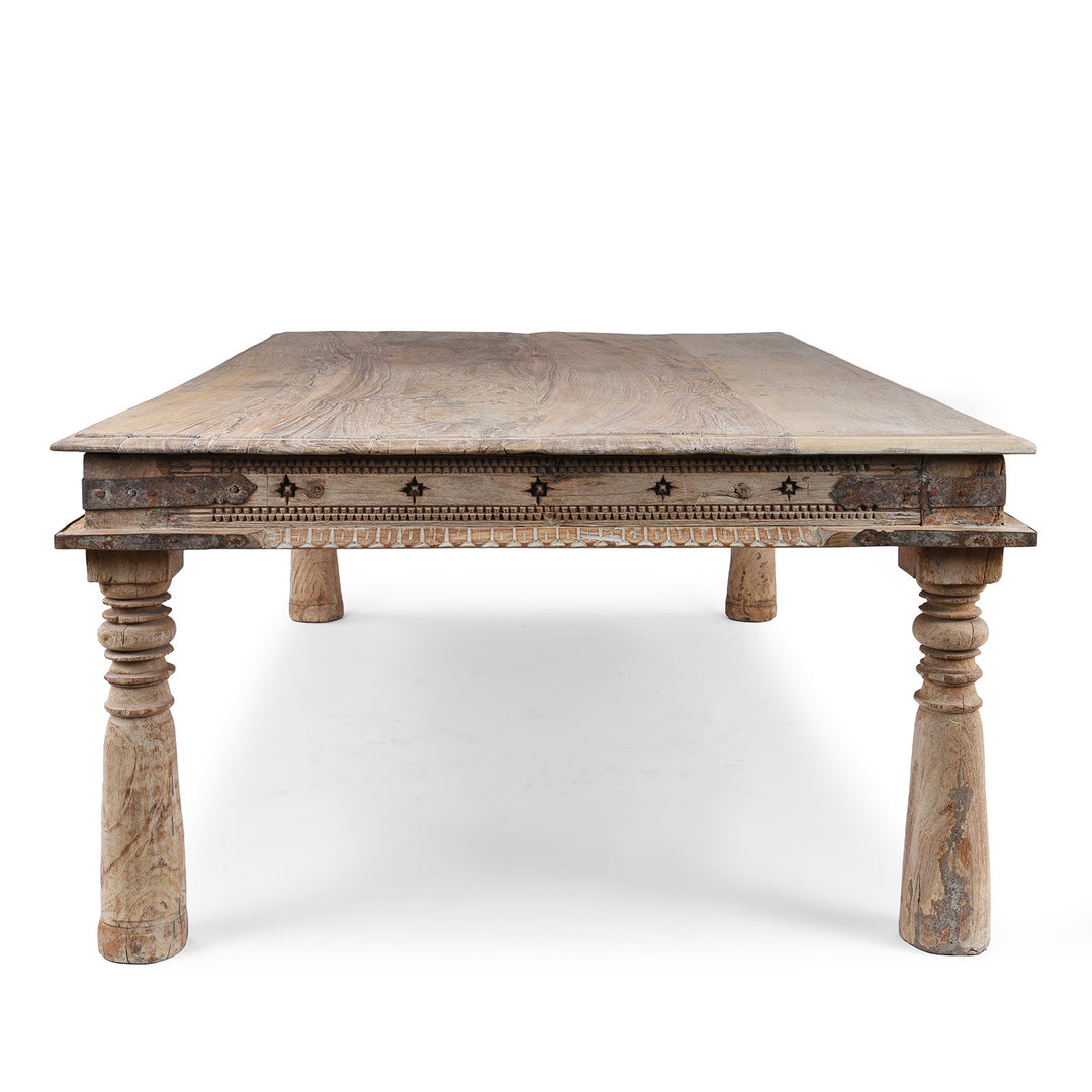 End View Of Bleached 19th Century Teak Takhat Table From Hyderabad With Hand Carved Star Motifs And Turned Legs | Indigo Antiques