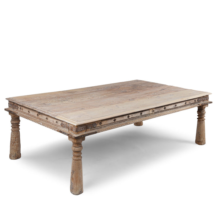 Angled VIew Of Bleached 19th Century Teak Takhat Table From Hyderabad With Hand Carved Star Motifs And Turned Legs | Indigo Antiques