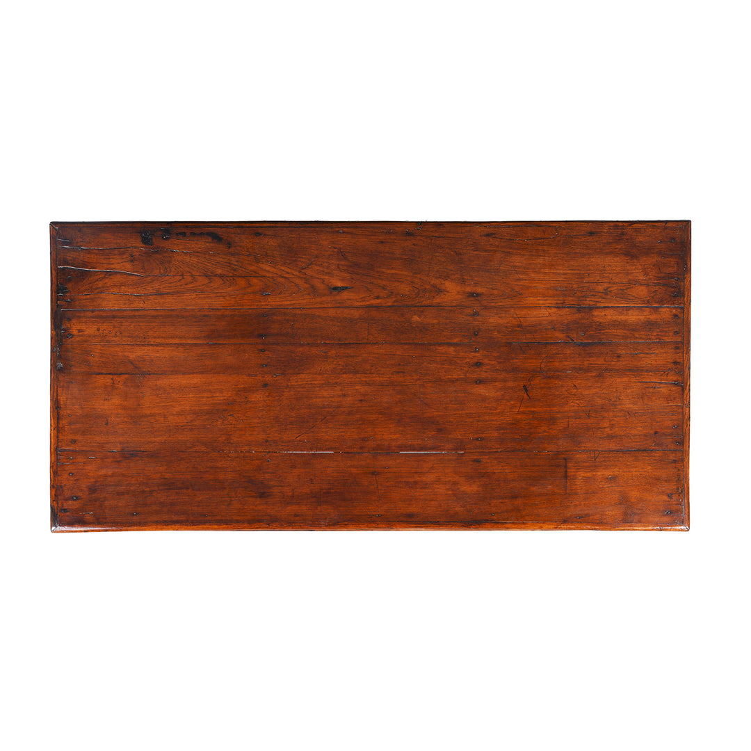 Top Down View Of Reclaimed Wood Coffee Table With Carved Floral Panels And Turned Legs