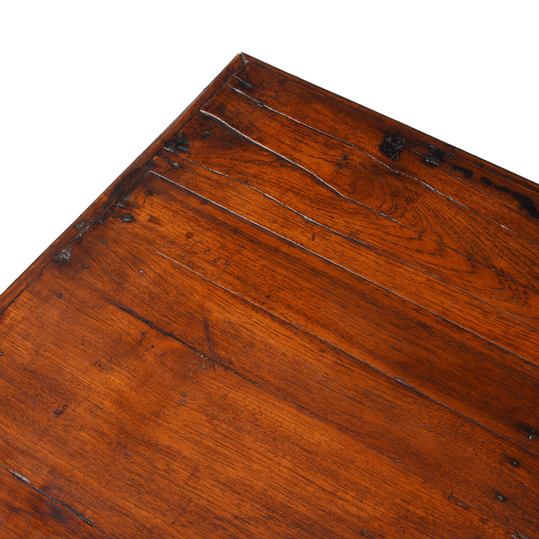 Top Corner Detail From Reclaimed Wood Coffee Table With Carved Floral Panels And Turned Legs