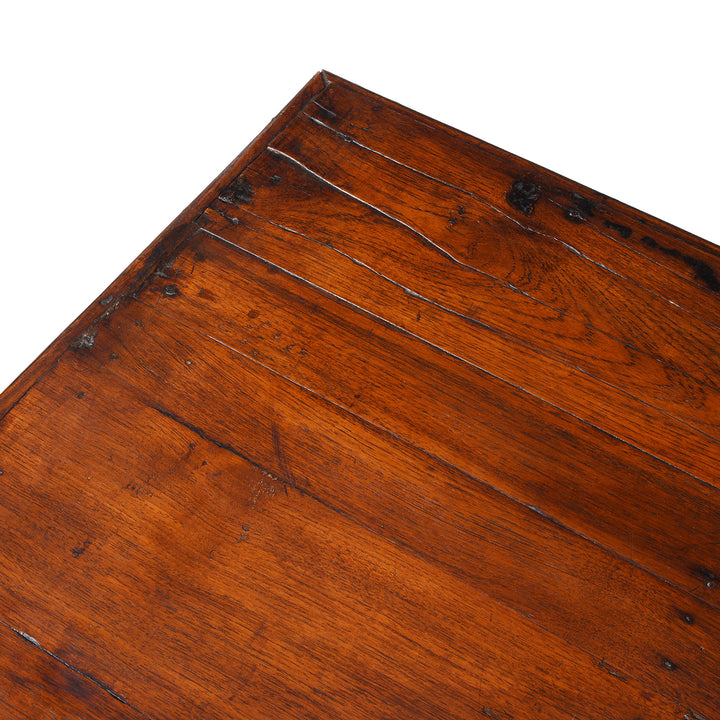 Top Corner Detail From Reclaimed Wood Coffee Table With Carved Floral Panels And Turned Legs