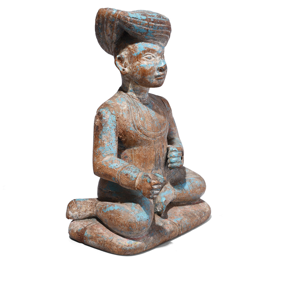 Angled View Of Antique Carved Gujarati Figure | Indigo Antiques