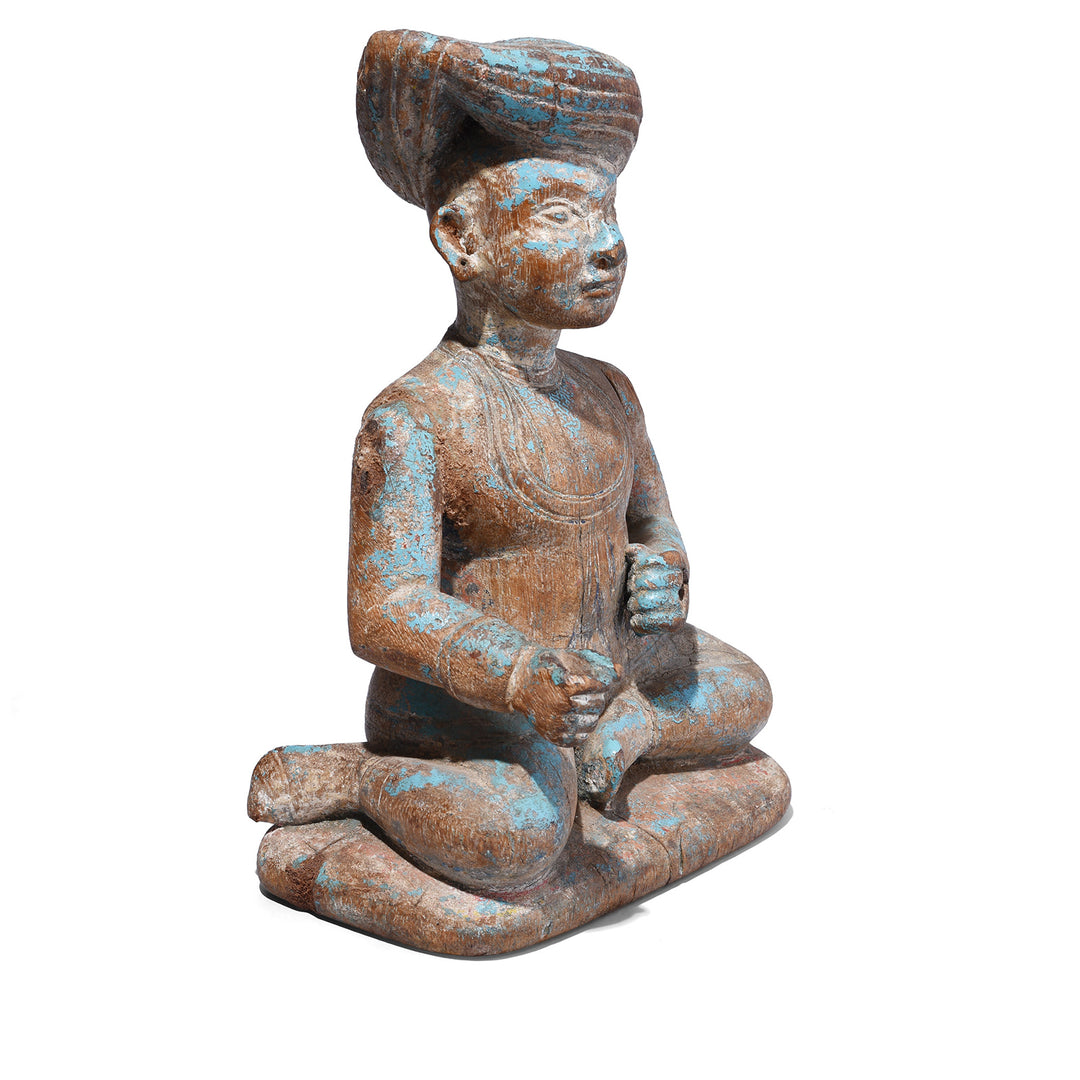Angled View Of Antique Carved Gujarati Figure | Indigo Antiques