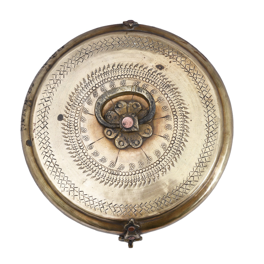 Top Down View Of Antique Indian Brass Chapati Box With Hand Engraved Geometric Decoration From Rajasthan