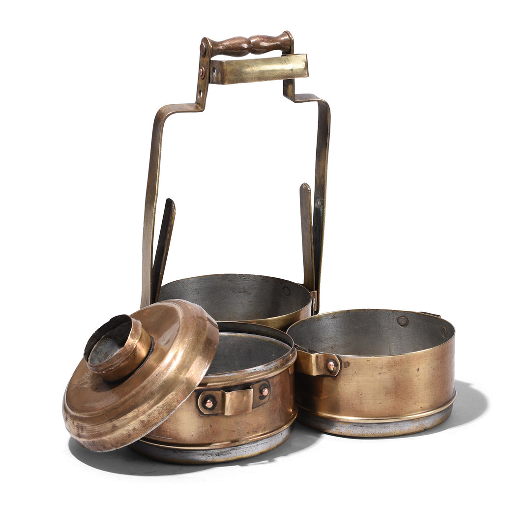 Deconstructed View Of Antique Three Tier Brass Indian Tiffin Box Dabba With Handle Circa Early 20th Century