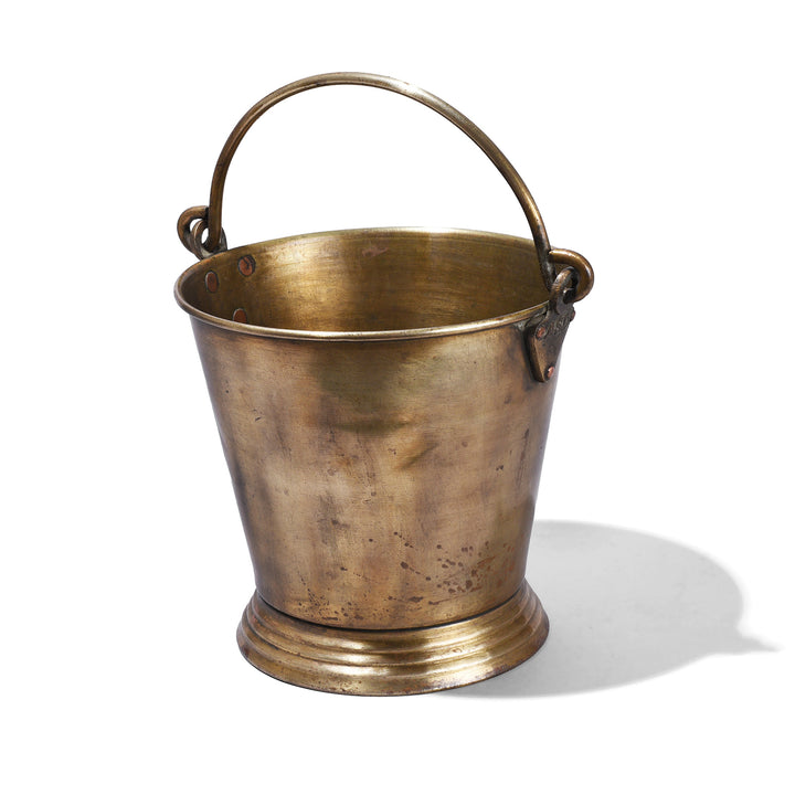 Indian Brass bucket with handle on a white background