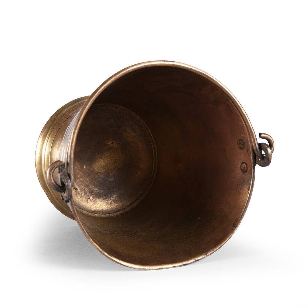 Interior Of Indian Brass bucket with handle on a white background