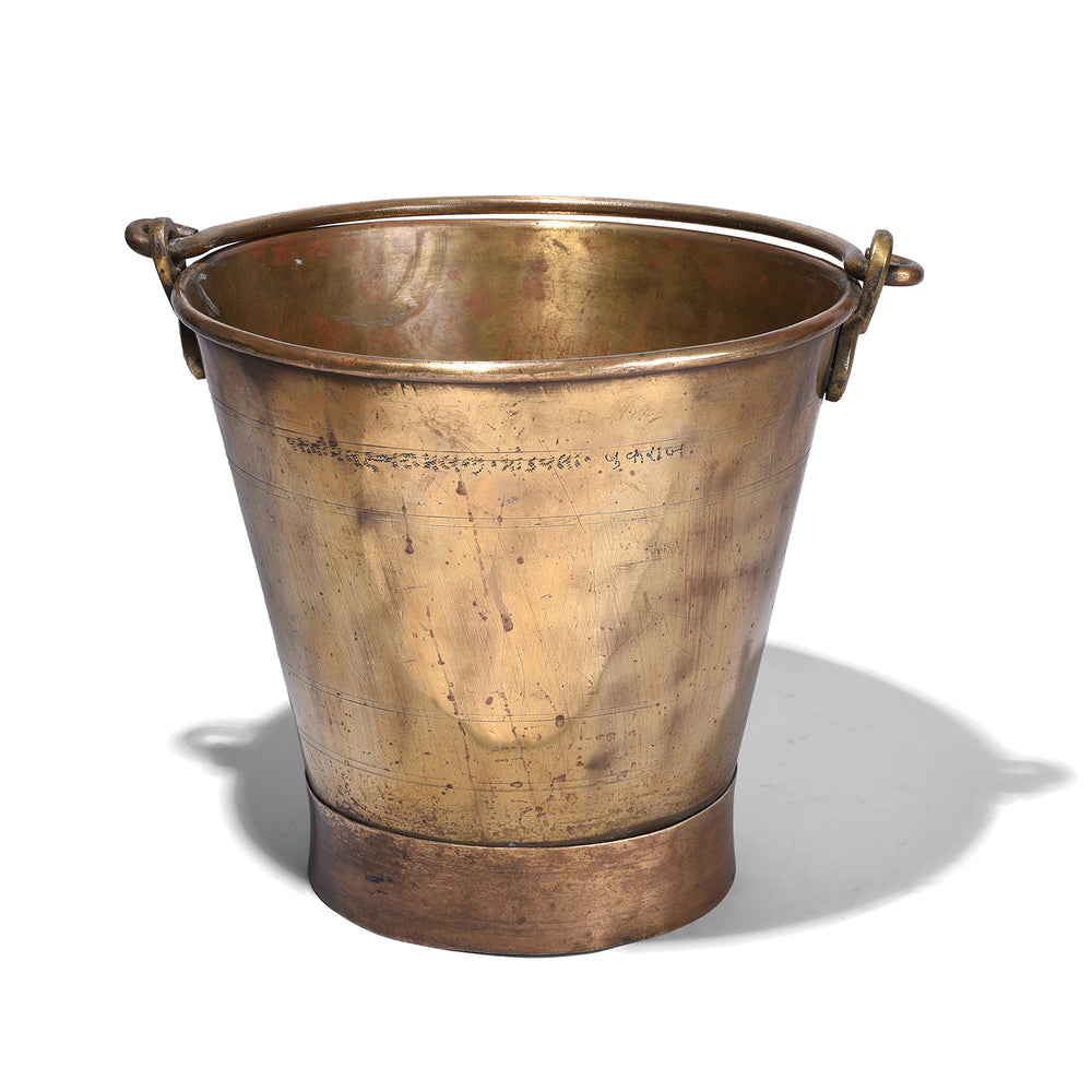 Indian brass bucket bears a punched Devanagari inscription reading नागपुर म्युनिसिपल कौंसिल १९५४ (Nagpur Municipal Council 1954)